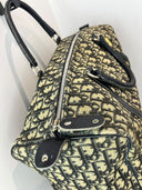 Profil du sac Dior Boston 40 et détail de sa fermeture à glissière