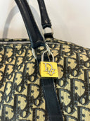 Cadenas Dior doré, anse sombre et motif Oblique du Boston 40