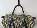 Fermeture zippée et anses du sac Dior Boston 40, vue rapprochée