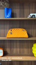 Chanel Sac Just Mademoiselle — Cuir verni orange matelassé, chaîne argentée