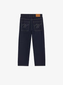Le pantalon de menuisier en denim brut