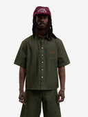 La chemise en denim brut vert