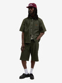 La chemise en denim brut vert