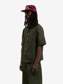 La chemise en denim brut vert