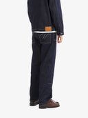 Le pantalon de menuisier en denim brut