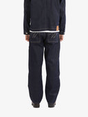Le pantalon de menuisier en denim brut