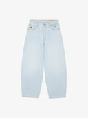 Le pantalon ballon en denim clair délavé
