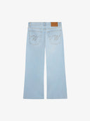 Le pantalon flare en denim clair délavé